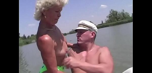  Granny Effie fucks next to a lake